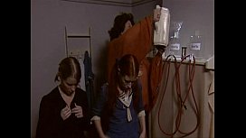 Mother gives her daughters enemas