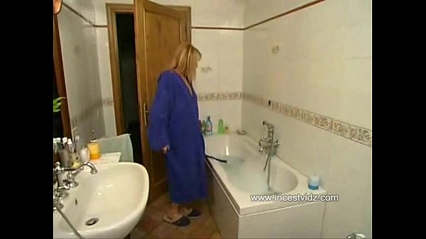 Chinese mom and son in shower scene